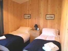 Click to see an enlarged view of the twin bedroom.